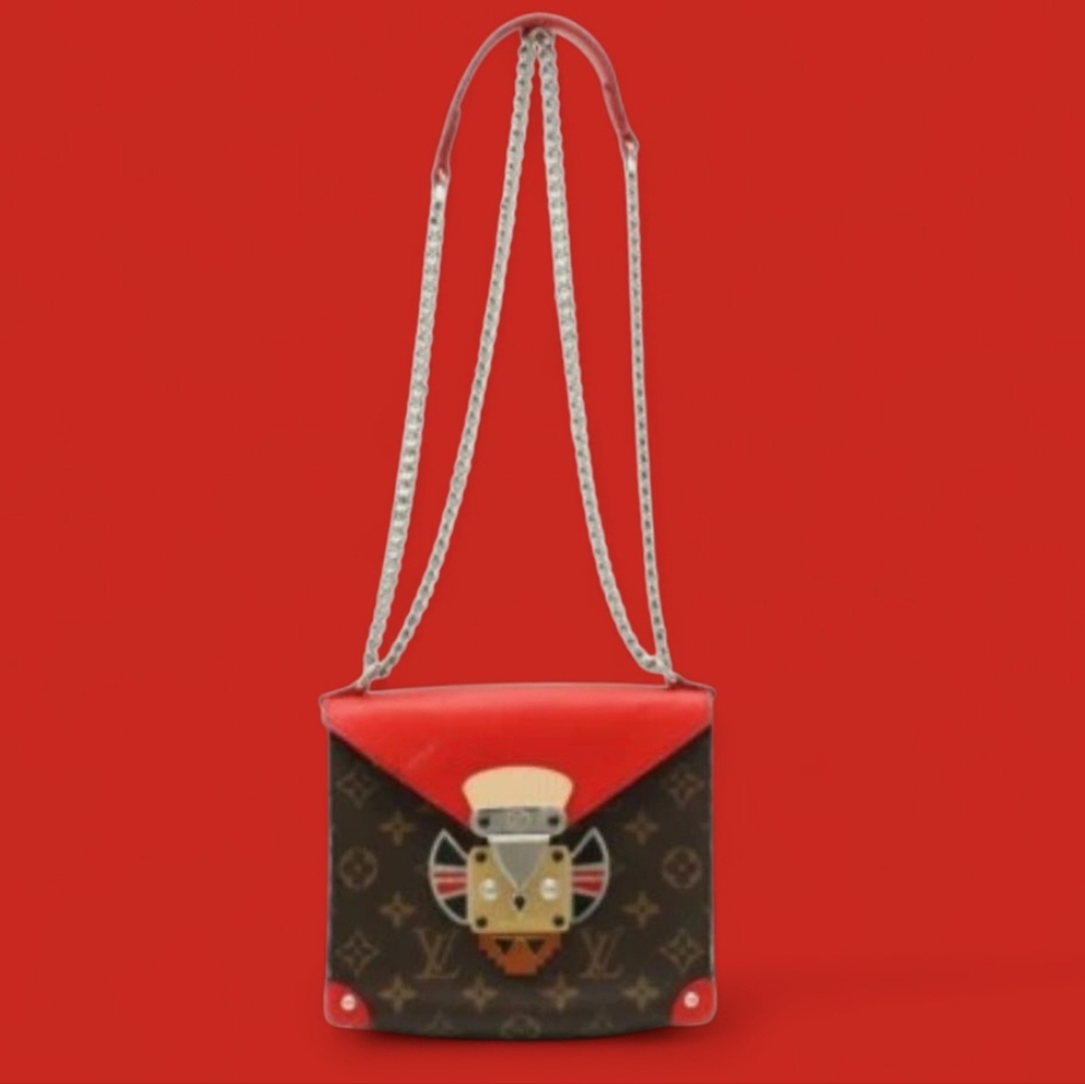 Louis Vuitton Monogram Tribal Mask Pochette Shoulder Chain Bag.